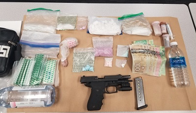Loaded firearm seized from man and woman during arrest