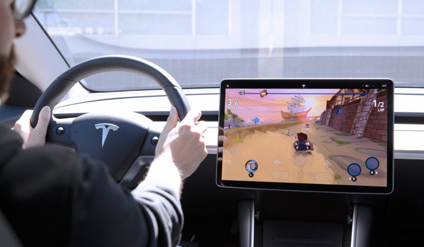 Tesla bows to pressure, halts playing video game while driving